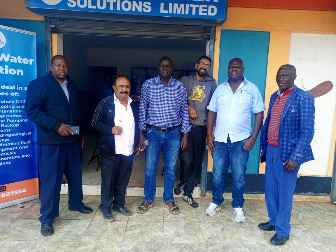 Team installing a solar water pump